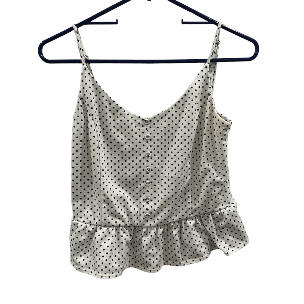 Beautiful white and black dotted blouse from boutique called Sophie Rue.